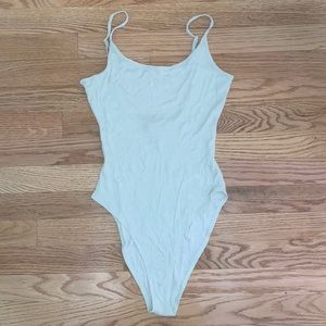 Low back scoop body suit